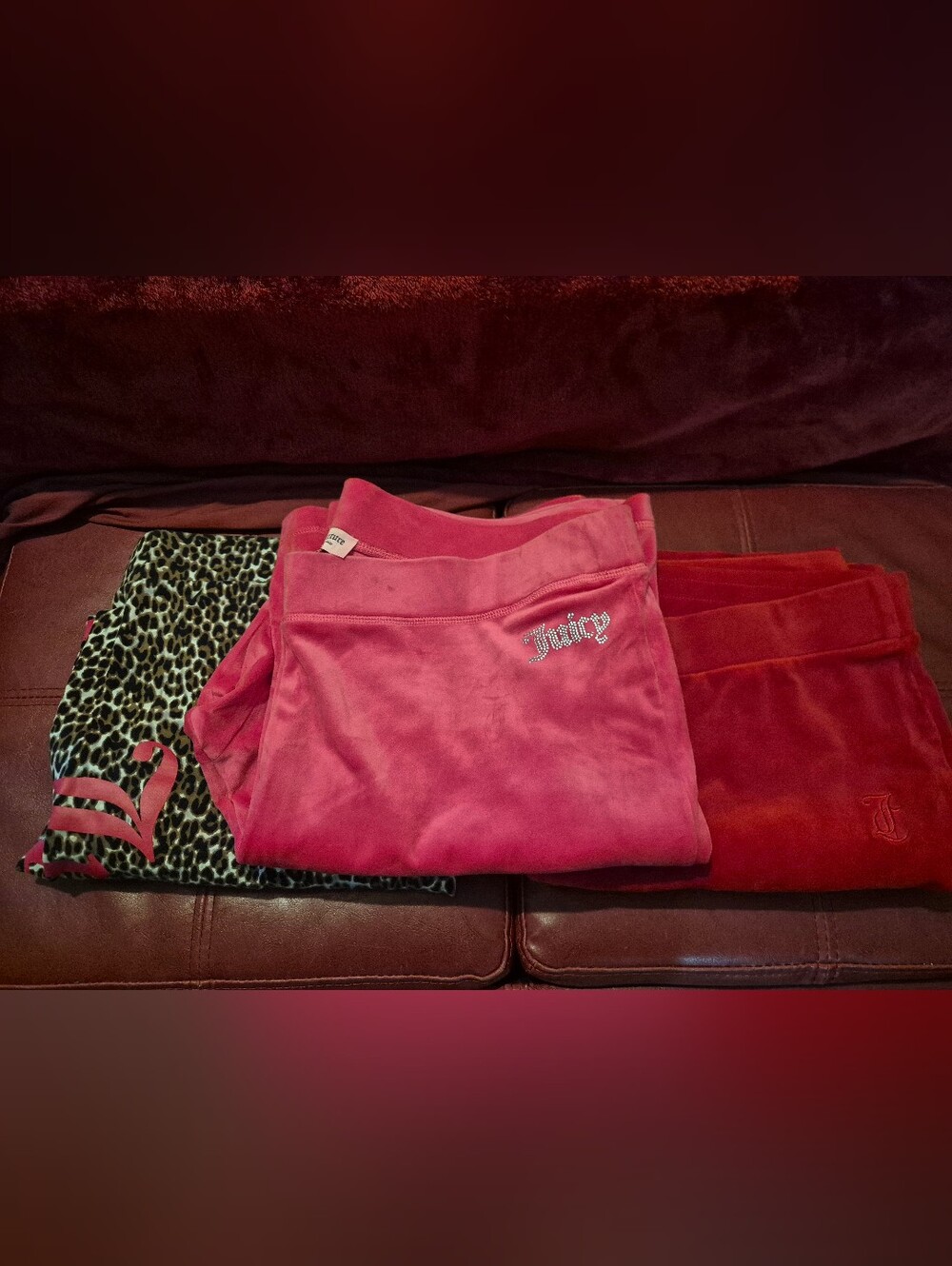 Three Pairs Of Juicy Couture Pants.